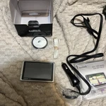 New Garmin 1350T Ultra-thin Gps Navigator With Lane Assist And Accesories. Fixed Price $50.00.